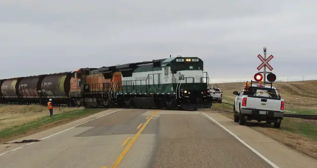 Great Western Railway train crossing Highway 13